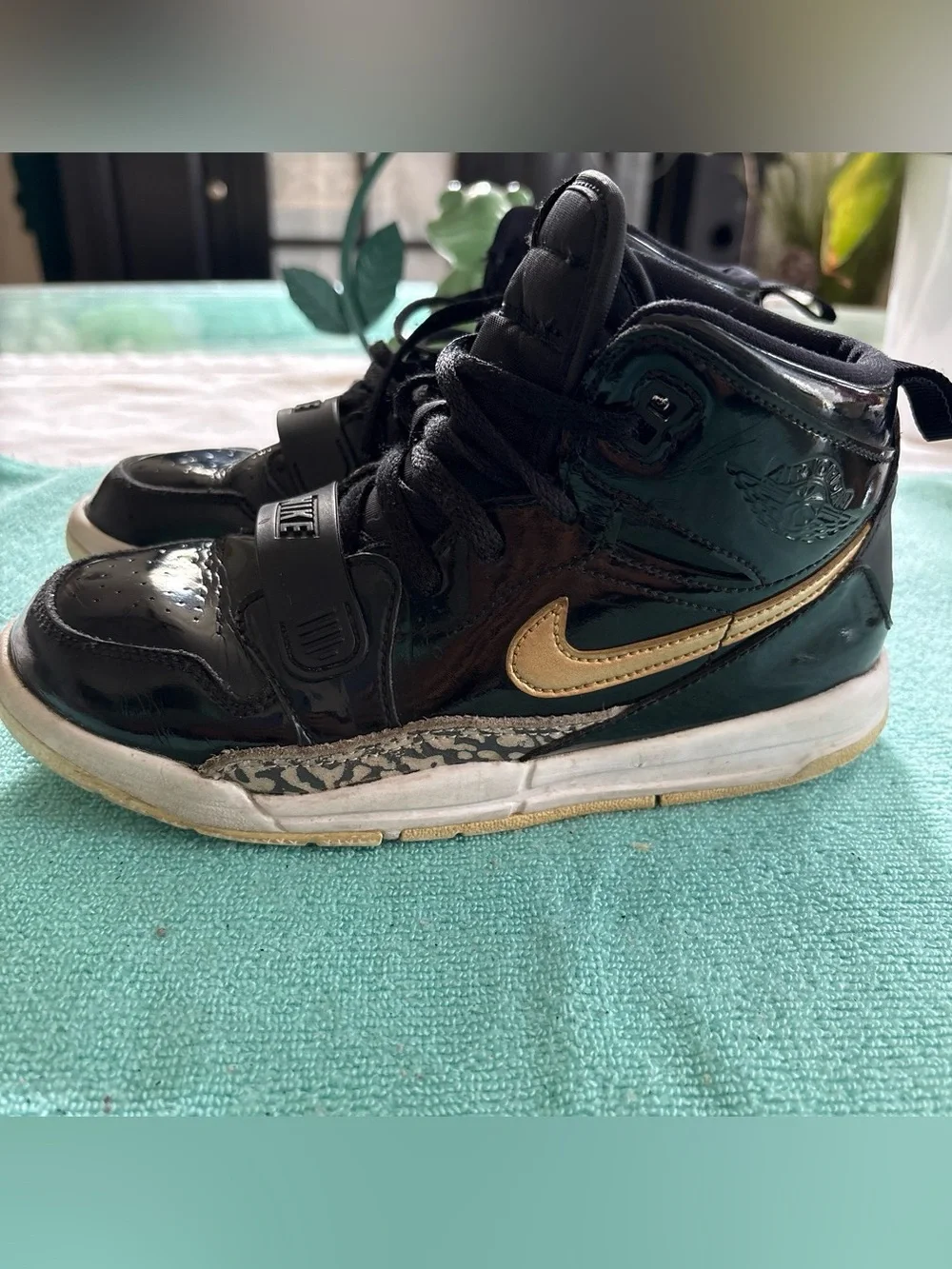 Nike Kids' High-Top Sneaker - Black with Gold Swoosh